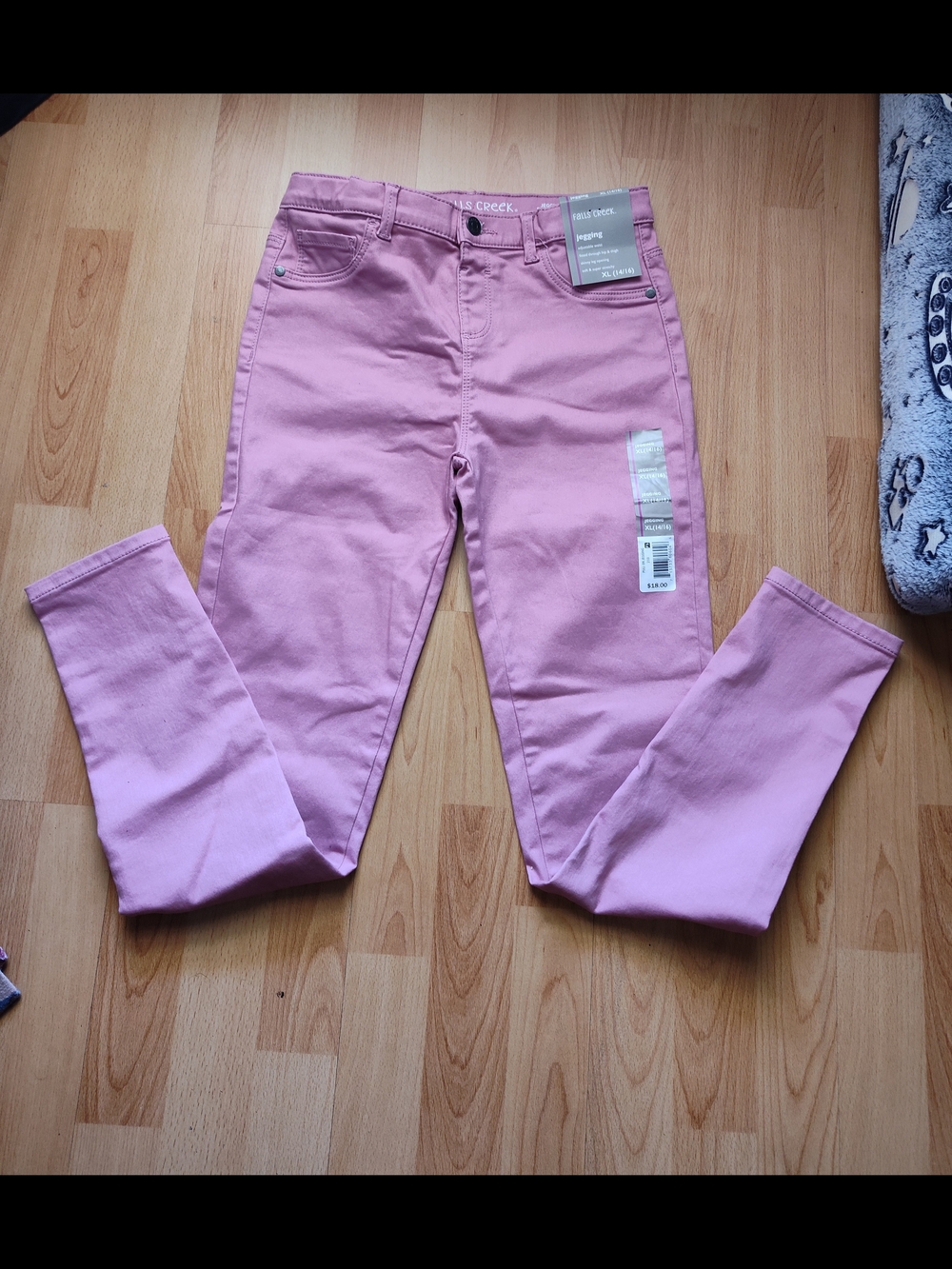 Girls NWT Falls Creek jeggings in size XL (14/16) are pink.